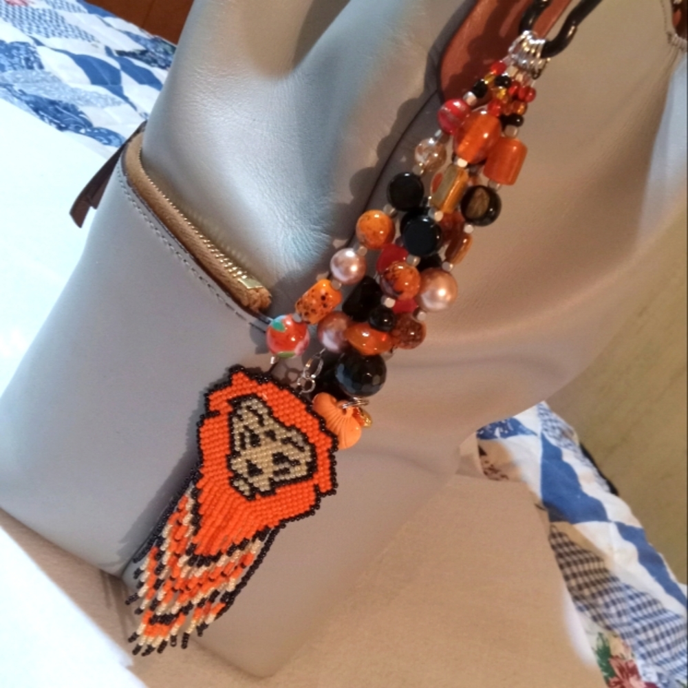 Hand crafted lion sprit animal seed bead purse charm